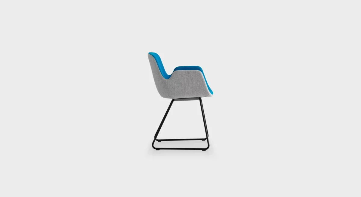PASS S130 lounge chair by Lapalma, designed by Hee Welling, featuring a fluid, wave-inspired profile with a sled base in matte chrome or powder-coated steel, upholstered in fire-retardant molded foam and available in fabric, eco-leather, or leather finishes.