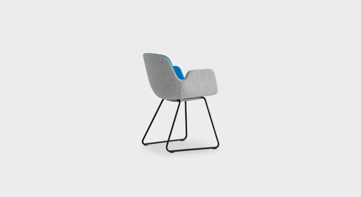 PASS S130 lounge chair by Lapalma, designed by Hee Welling, featuring a fluid, wave-inspired profile with a sled base in matte chrome or powder-coated steel, upholstered in fire-retardant molded foam and available in fabric, eco-leather, or leather finishes.