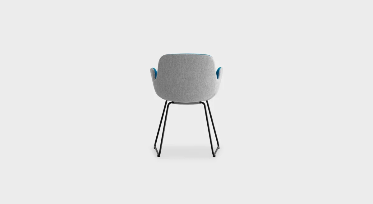 PASS S130 lounge chair by Lapalma, designed by Hee Welling, featuring a fluid, wave-inspired profile with a sled base in matte chrome or powder-coated steel, upholstered in fire-retardant molded foam and available in fabric, eco-leather, or leather finishes.