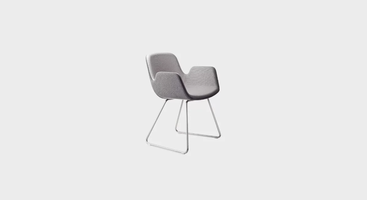 PASS S130 lounge chair by Lapalma, designed by Hee Welling, featuring a fluid, wave-inspired profile with a sled base in matte chrome or powder-coated steel, upholstered in fire-retardant molded foam and available in fabric, eco-leather, or leather finishes.