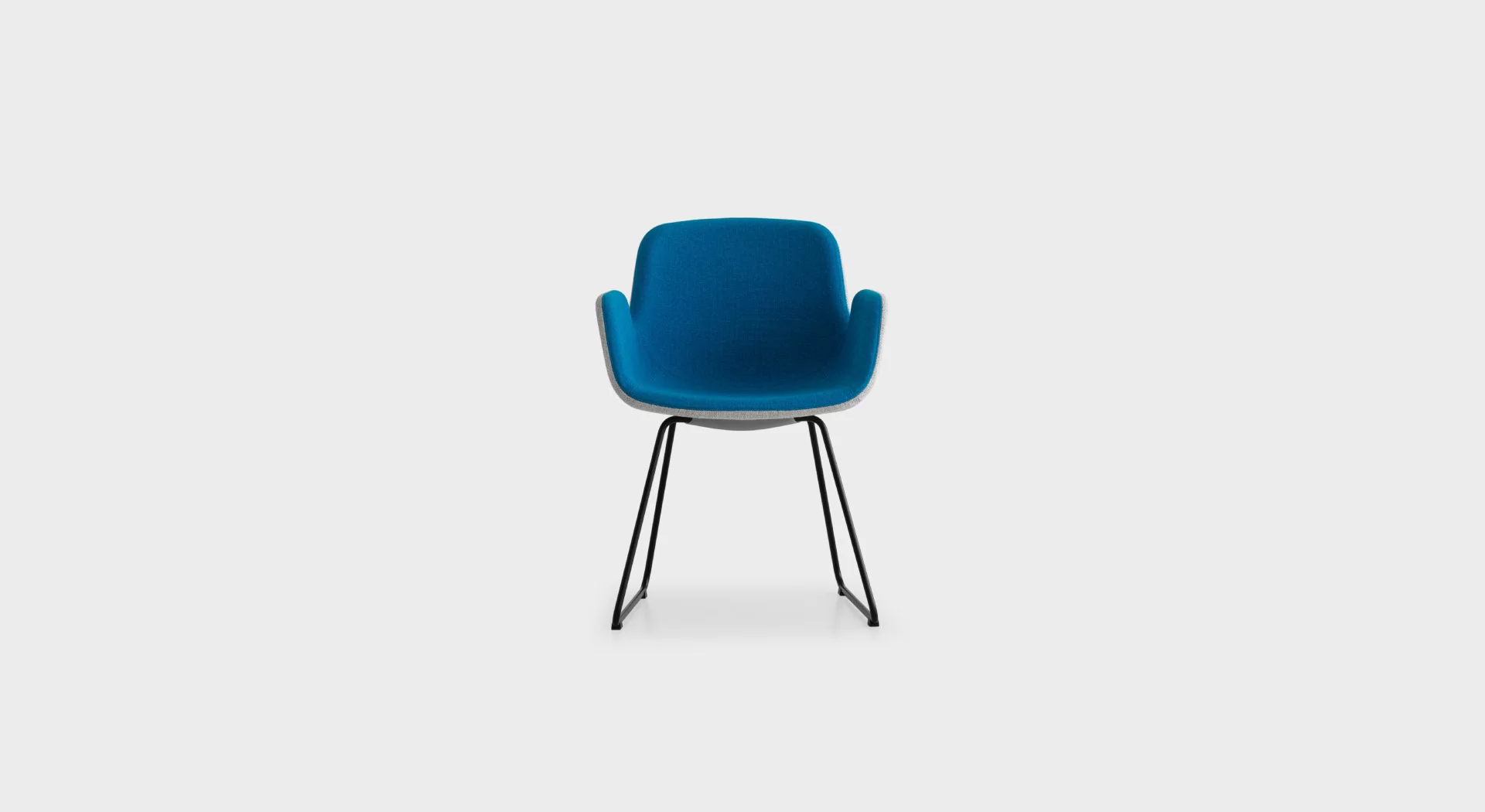 PASS S130 lounge chair by Lapalma, designed by Hee Welling, featuring a fluid, wave-inspired profile with a sled base in matte chrome or powder-coated steel, upholstered in fire-retardant molded foam and available in fabric, eco-leather, or leather finishes.