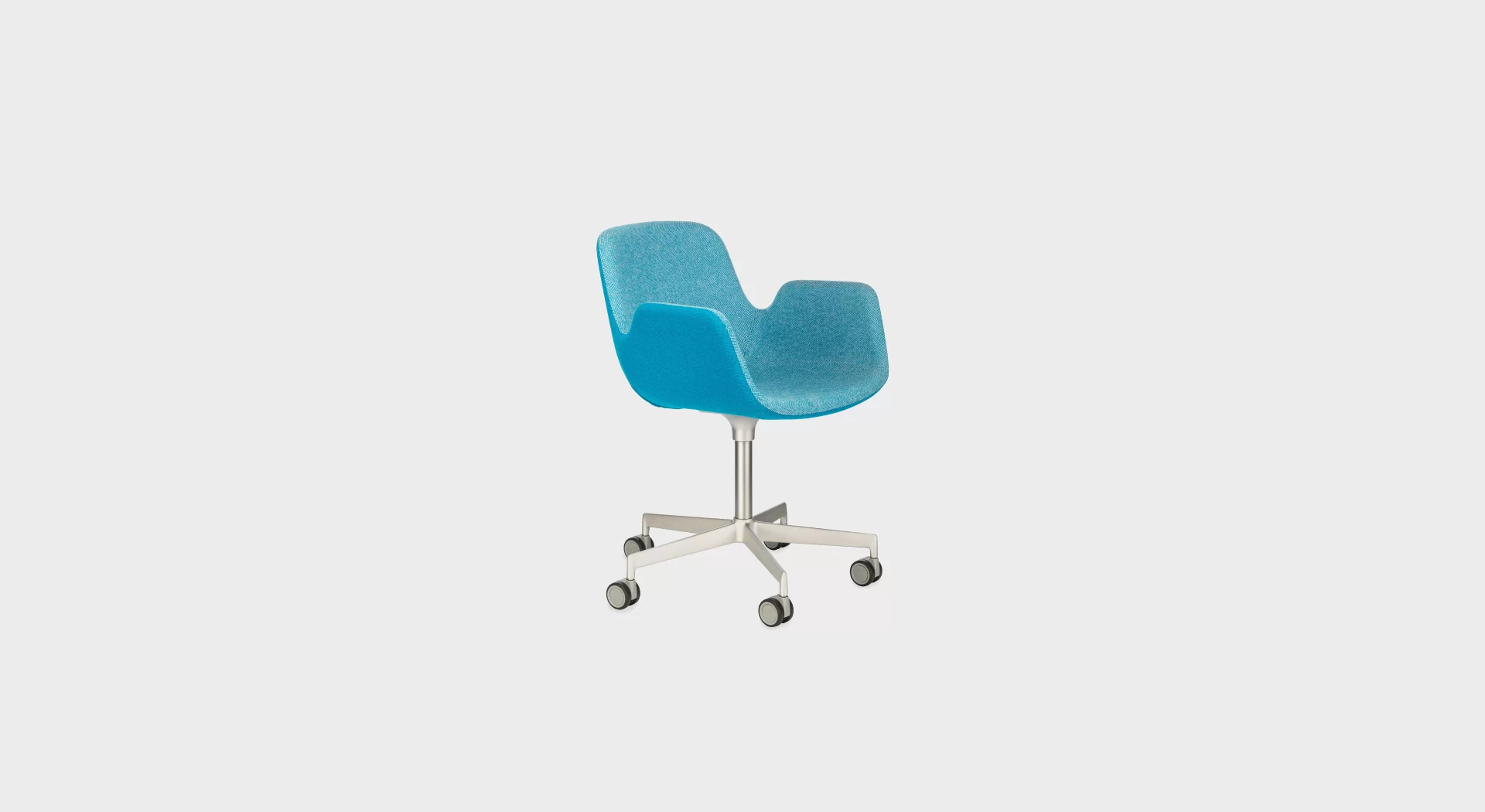 Lapalma Pass S134 swivel lounge chair with 5-star base, castors, and upholstered shell, designed by Hee Welling.