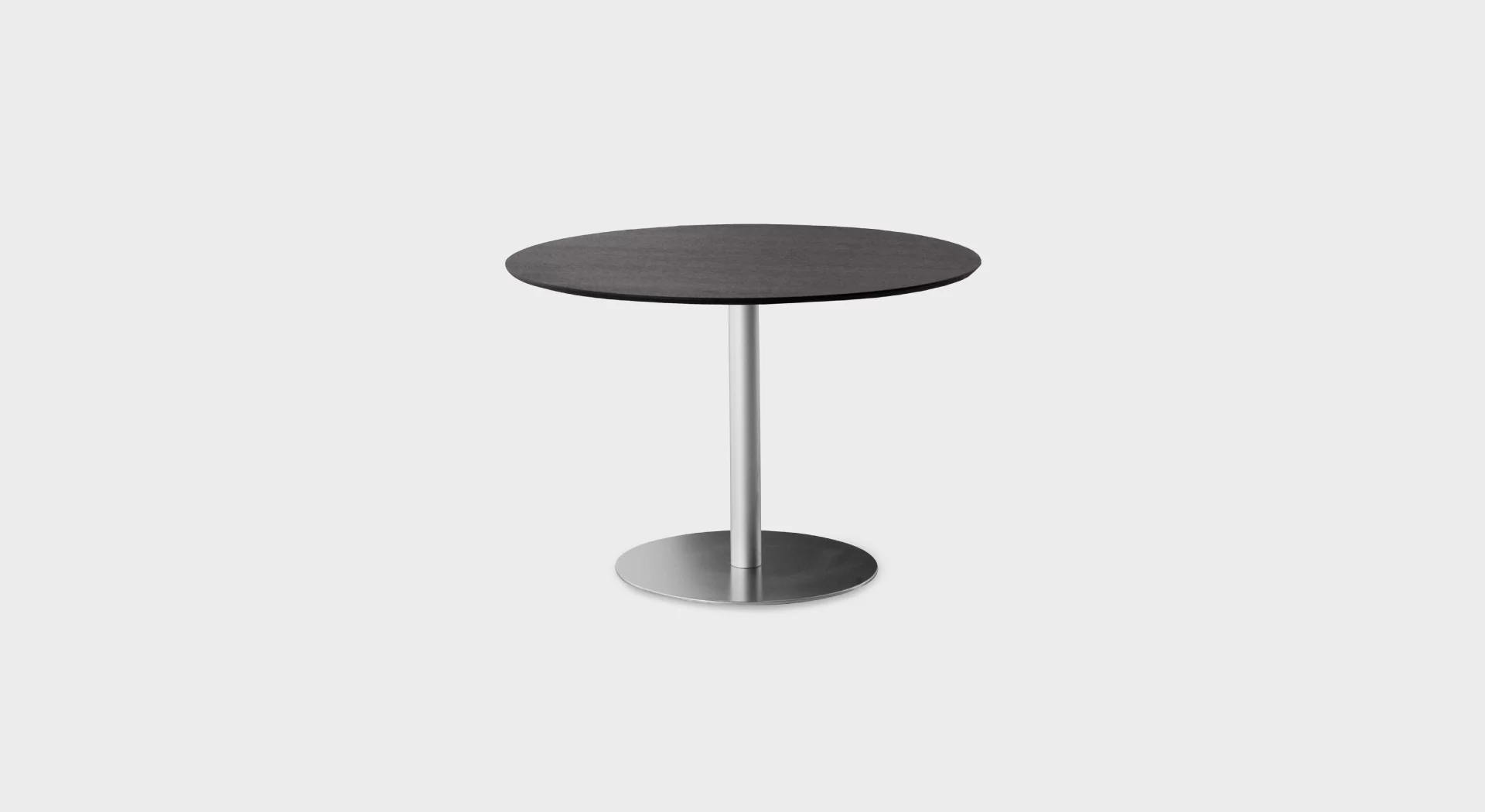 “Lapalma RONDÒ 120 H73 table with Ø120 cm white laminate top and stainless steel base, positioned in a modern dining room setting.”