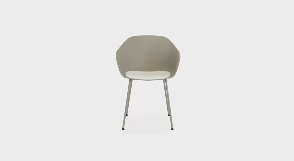 Seela S312 chair by Lapalma, designed by Antti Kotilainen, featuring a polypropylene shell with a removable seat pad in wood or fabric, and a matte chrome or powder-coated steel base.