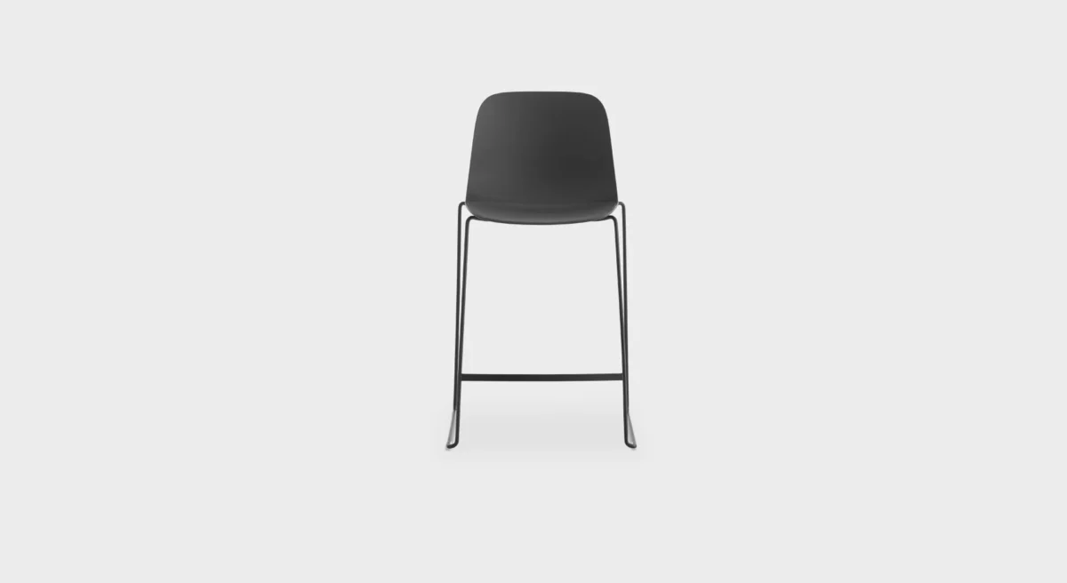 Textural detail of interchangeable cushion pads in grey, white, and black for ES320 outdoor stool