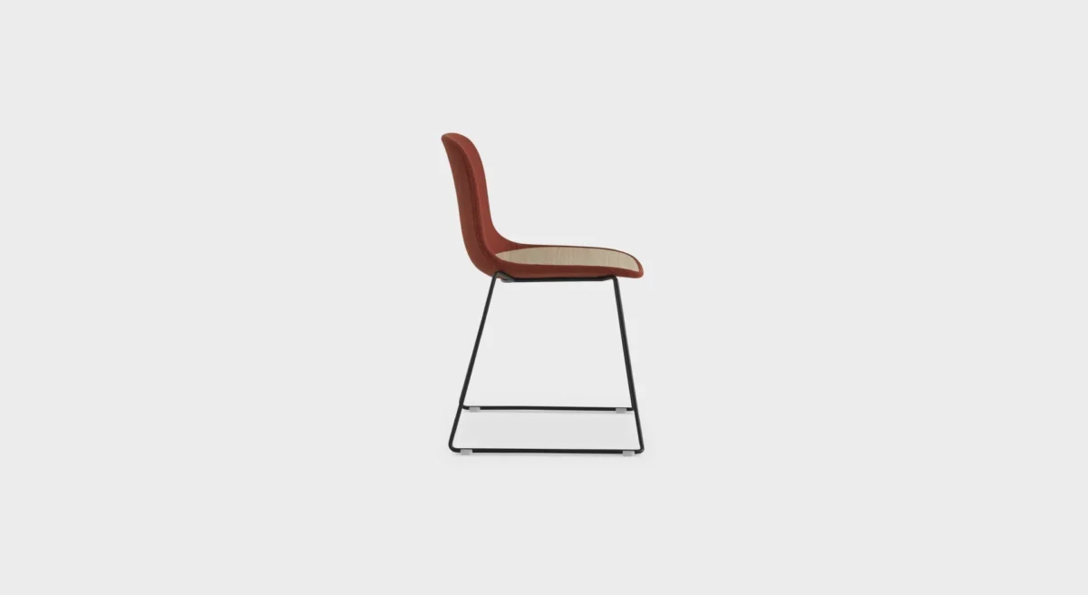 Lapalma Seela S310 chair with sleek sled base and durable polypropylene seat, designed for modern spaces.
