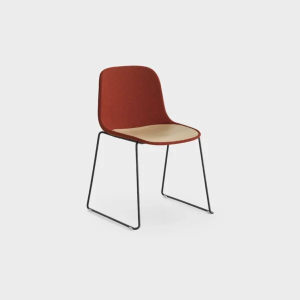 Lapalma Seela S310 chair with sled base, featuring a polypropylene shell and integrated wooden seat insert.