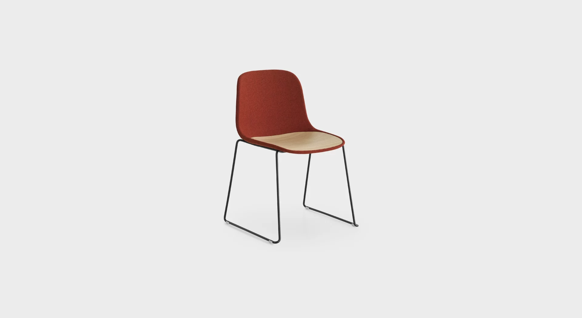 Lapalma Seela S310 chair with sled base, featuring a polypropylene shell and integrated wooden seat insert.