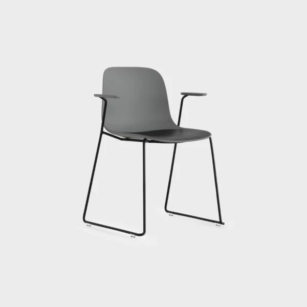 Modern stackable chair with a minimalist design, featuring a curved polypropylene shell and sleek sled base for comfort and versatility.