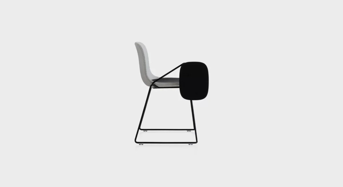Compact bar stool with round seat and minimalist metal frame by Lapalma.