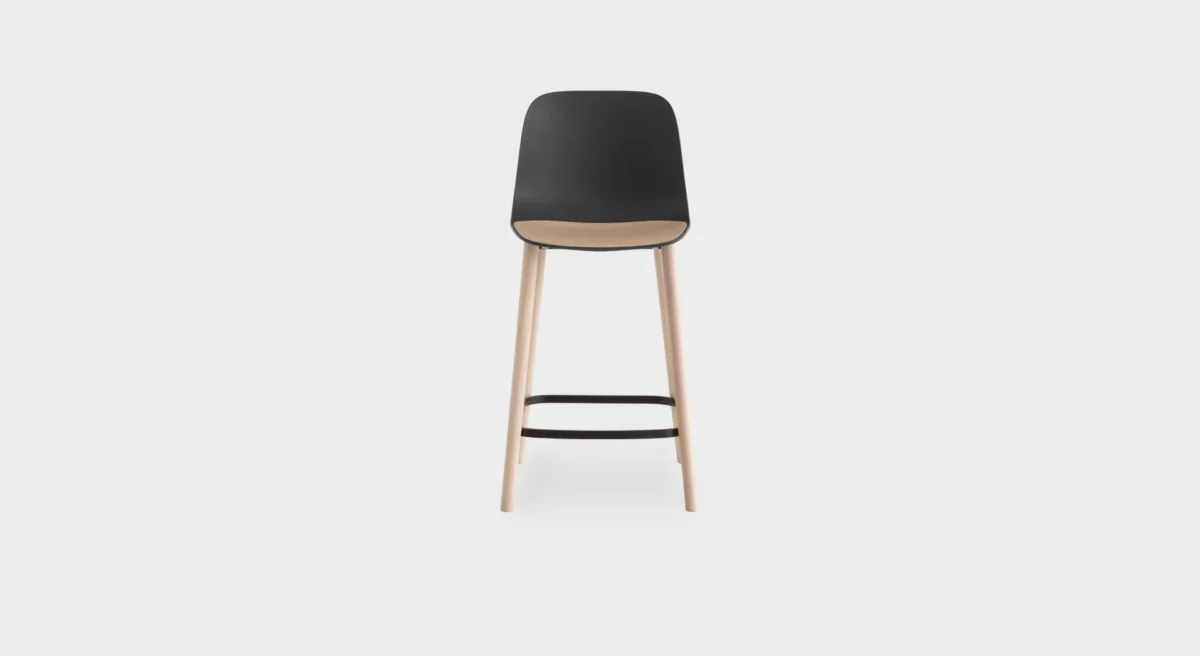 Seela S326 H65 counter stool by Lapalma with polypropylene shell, interchangeable wooden or upholstered seat insert, and solid wood legs in various finishes.