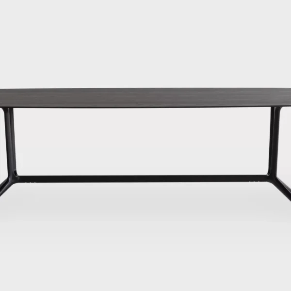 Compact round side table with slim pedestal base by Lapalma.