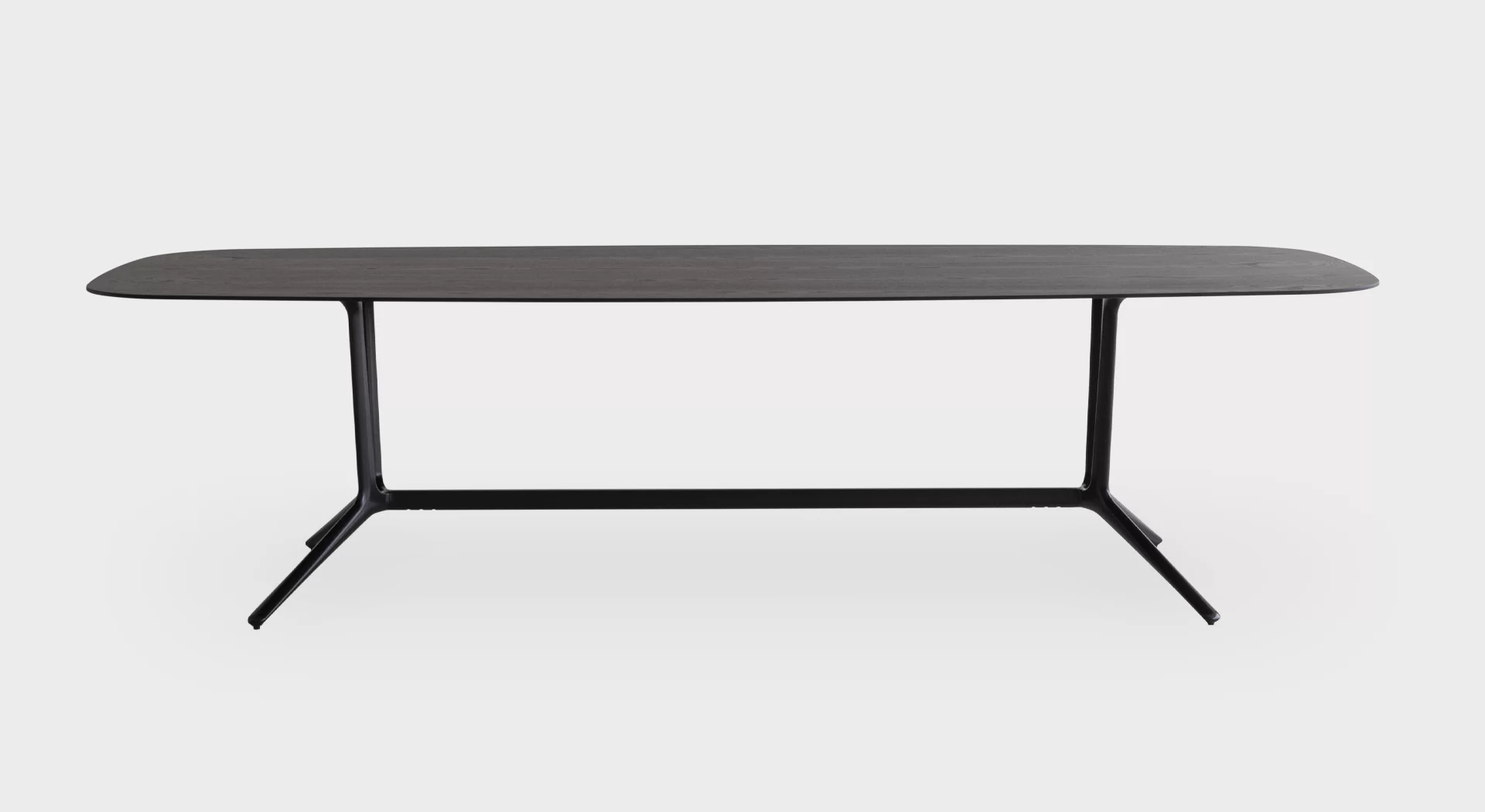 Compact round side table with slim pedestal base by Lapalma.