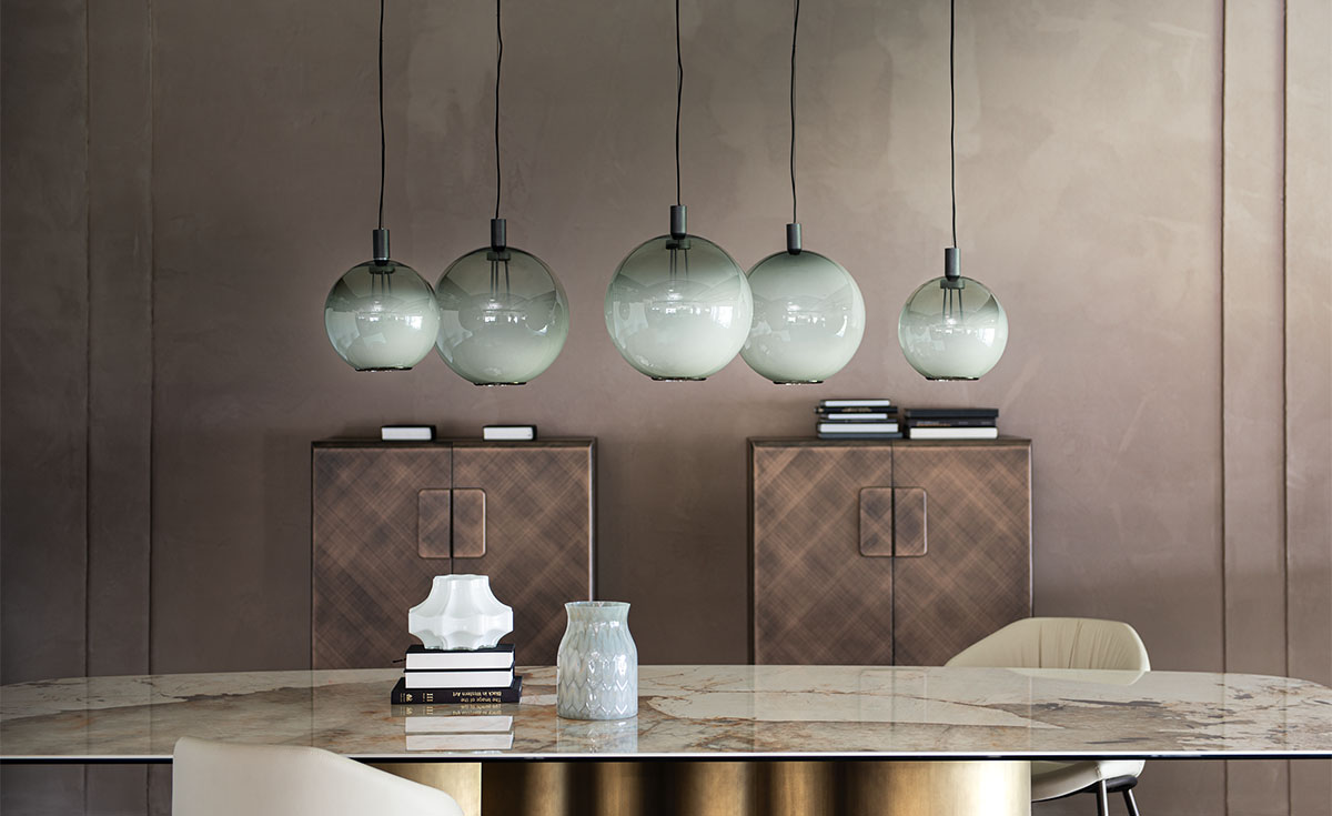 "Cattelan Italia PARIS – sculptural suspension lamp featuring layered glass discs and refined metal detailing"