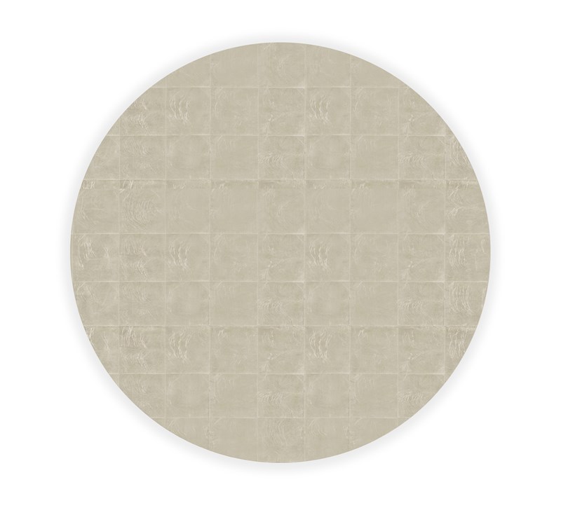 Glamorous cocktail table featuring a circular silhouette and fashion-inspired design details.
