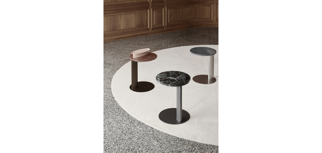 Dali side table by Nicoline Italia featuring a round Azul Macaubas marble top and titanium metal base.