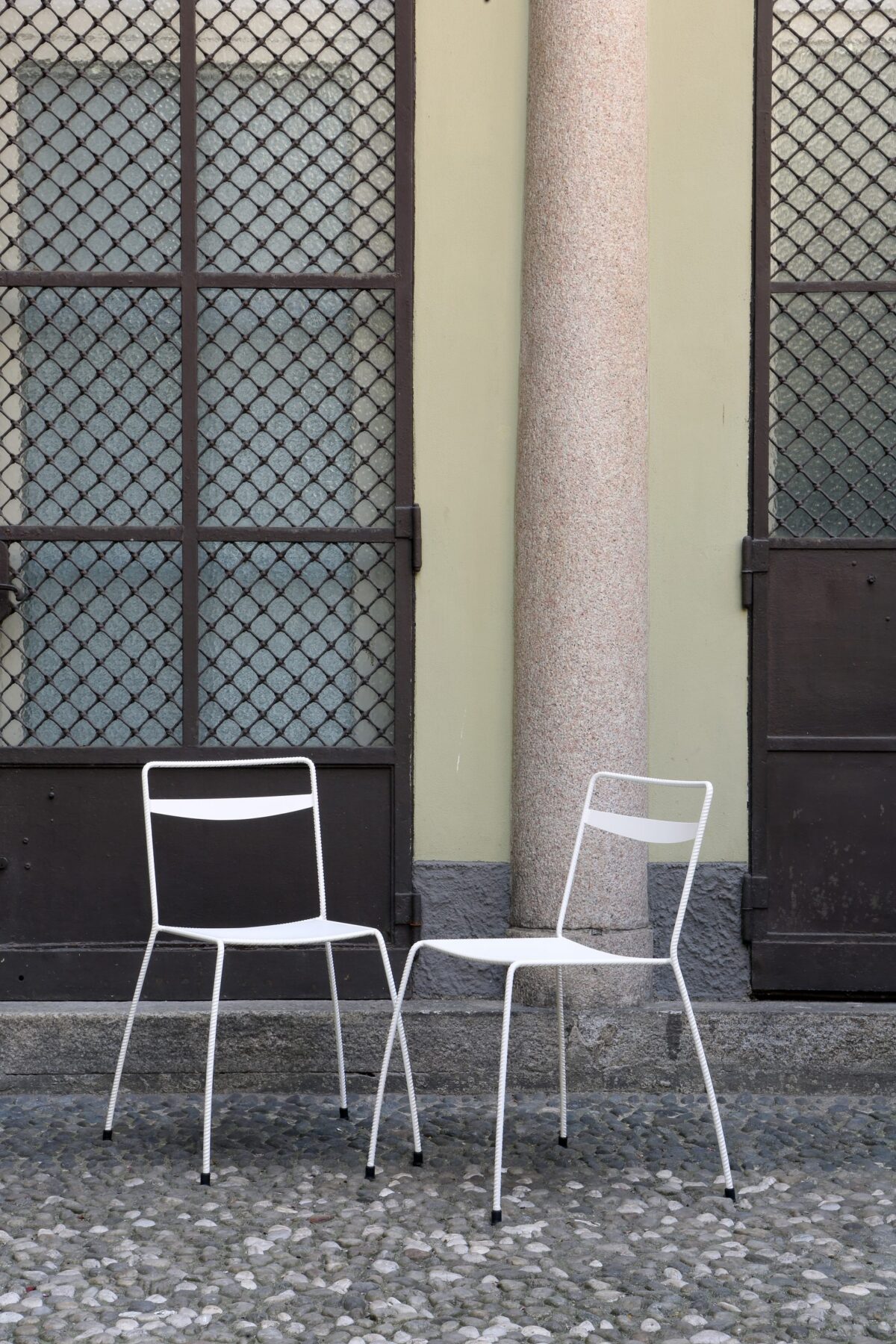 Tondella Chair stacked to emphasize its space-saving feature, ideal for events and gatherings.