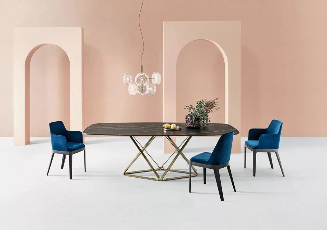 Contemporary interior showcasing Delta by Bontempi – rectangular glass top with intricate metal X‑frame.
