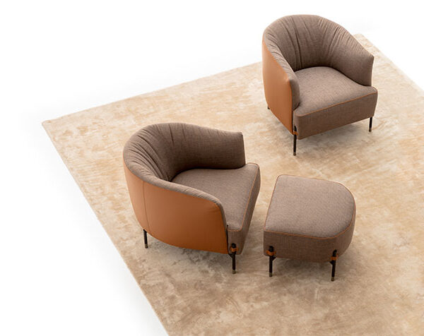 Diga armchair by Nicoline Italia with enveloping lines and external legs, perfect for modern interiors in Royal Oak, Michigan.