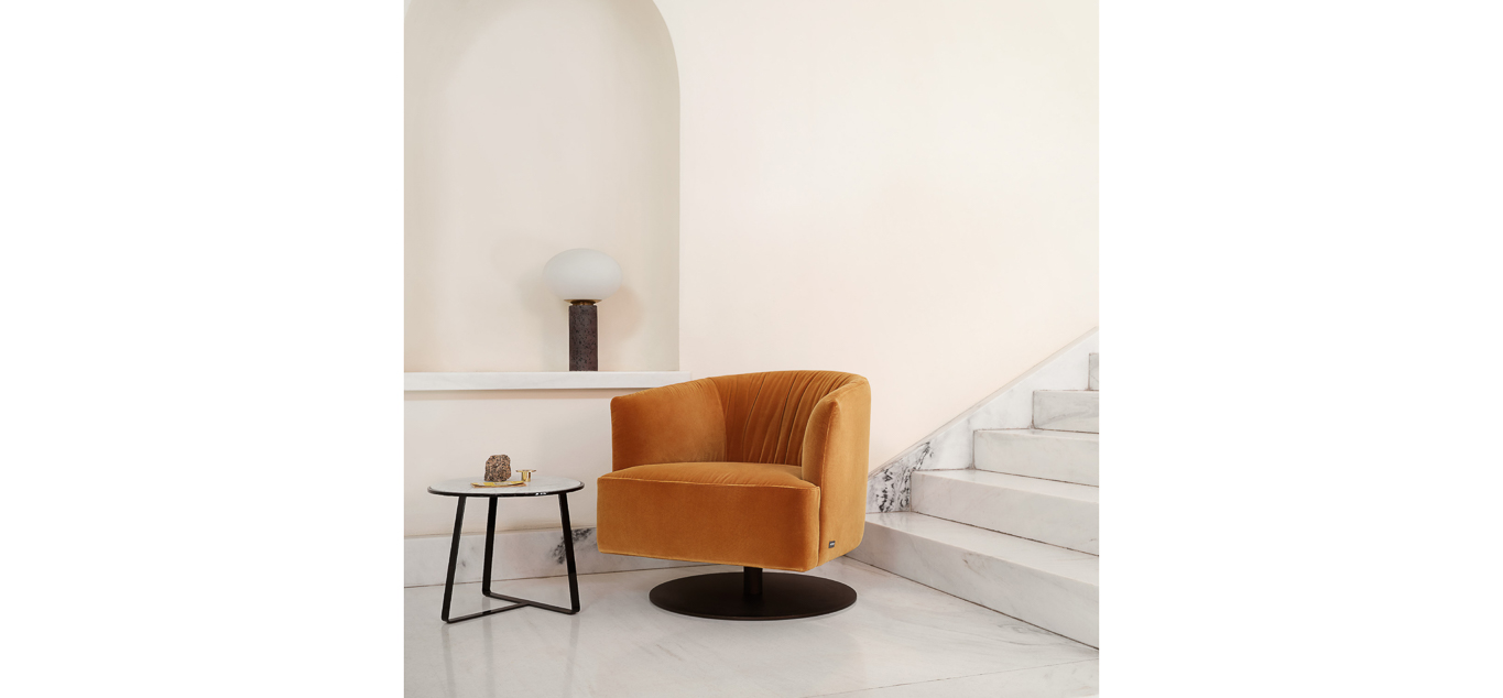 Diga Swivel armchair by Nicoline Italia with 360° rotating base and enveloping backrest, ideal for modern interiors in Royal Oak, Michigan.