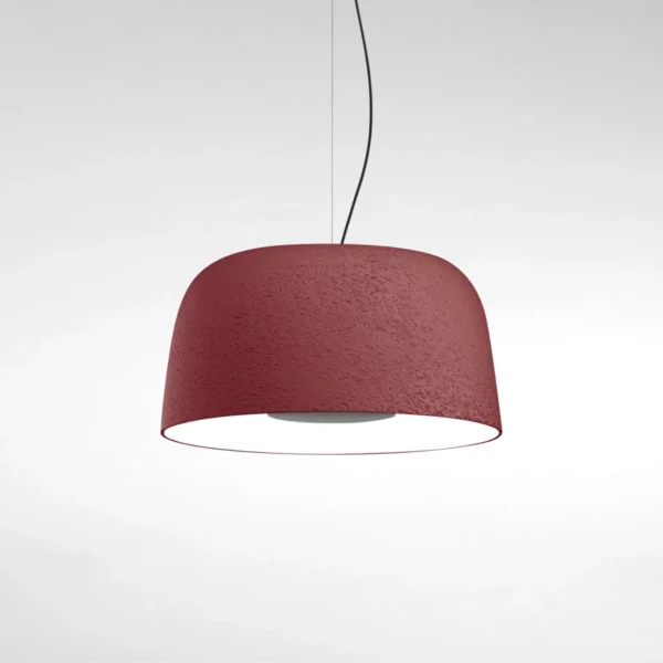 “Djembé by Marset ceiling lamp – sculptural dome-shaped light with textured stone-like exterior”