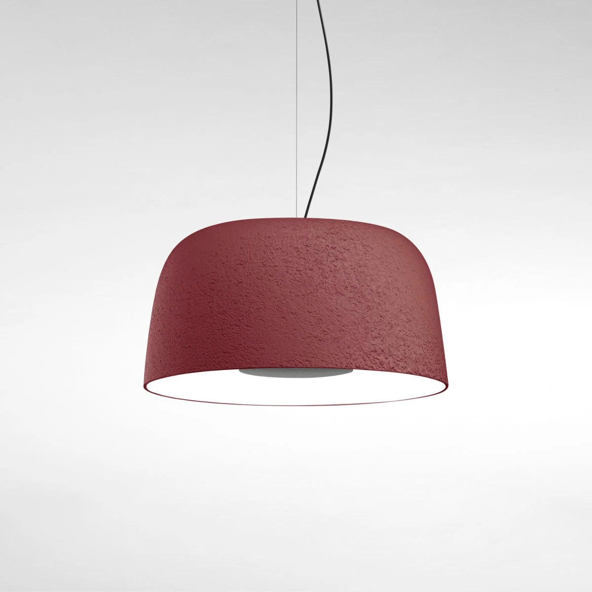 “Djembé by Marset ceiling lamp – sculptural dome-shaped light with textured stone-like exterior”