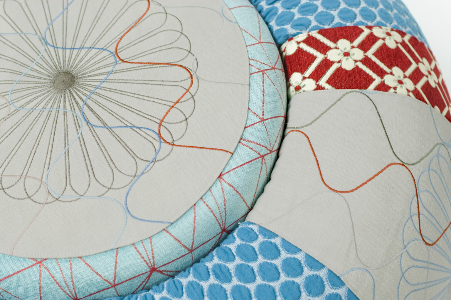 Donut by Moroso in plush circular upholstered form, front view in a Royal Oak Michigan showroom