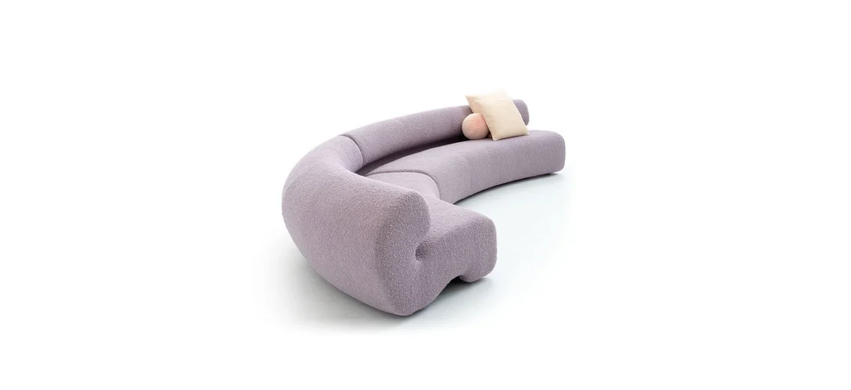 Gruuve Sofa by Moroso side profile highlighting its soft sculptural backrest and sleek seat in a Troy Michigan setting