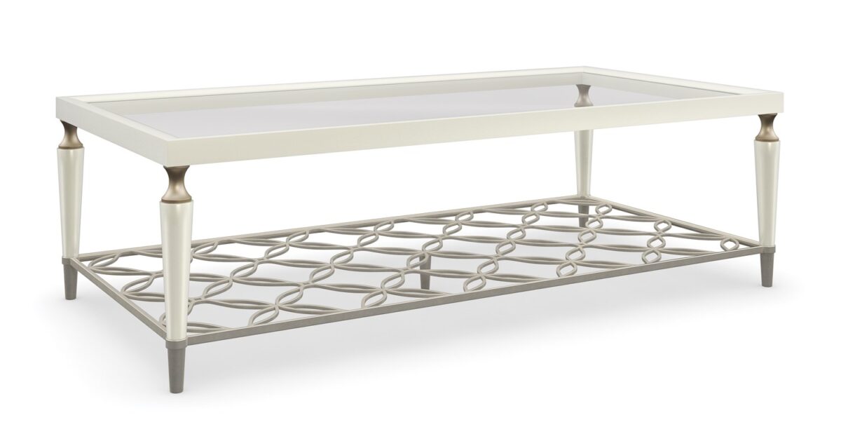Easily Charming by Caracole — a stylish side table with a round wooden top and slender metal legs.