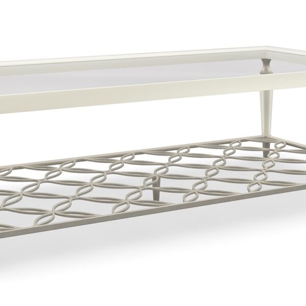 Easily Charming by Caracole — a stylish side table with a round wooden top and slender metal legs.