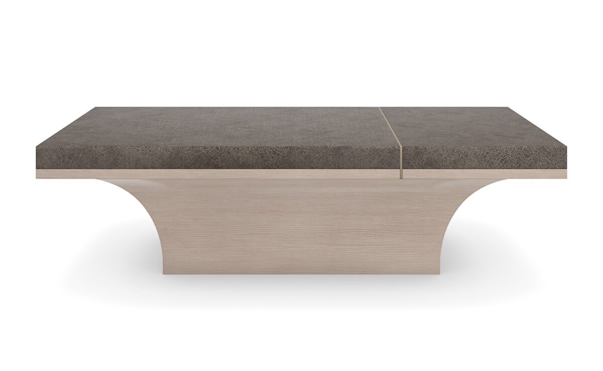 Minimalist Caracole cocktail table with dark wood tones and subtle floating effect.