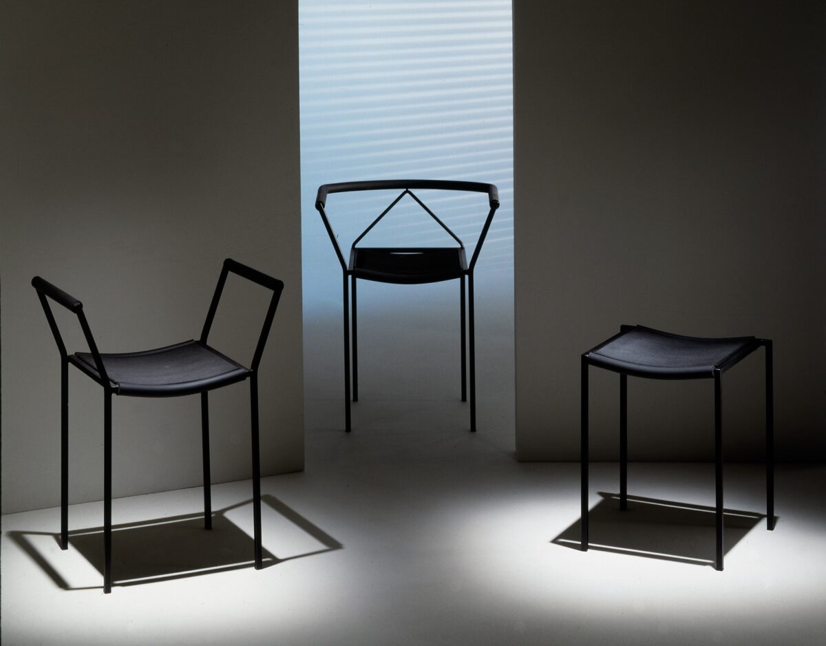 “SGABELLO Basso stool displayed in a set of four, illustrating its stackable design and space-saving appeal.”