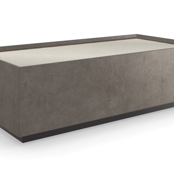 Dark Matter Cocktail Table by Caracole — a dramatic round table with a dark, polished top and sculptural metallic base.