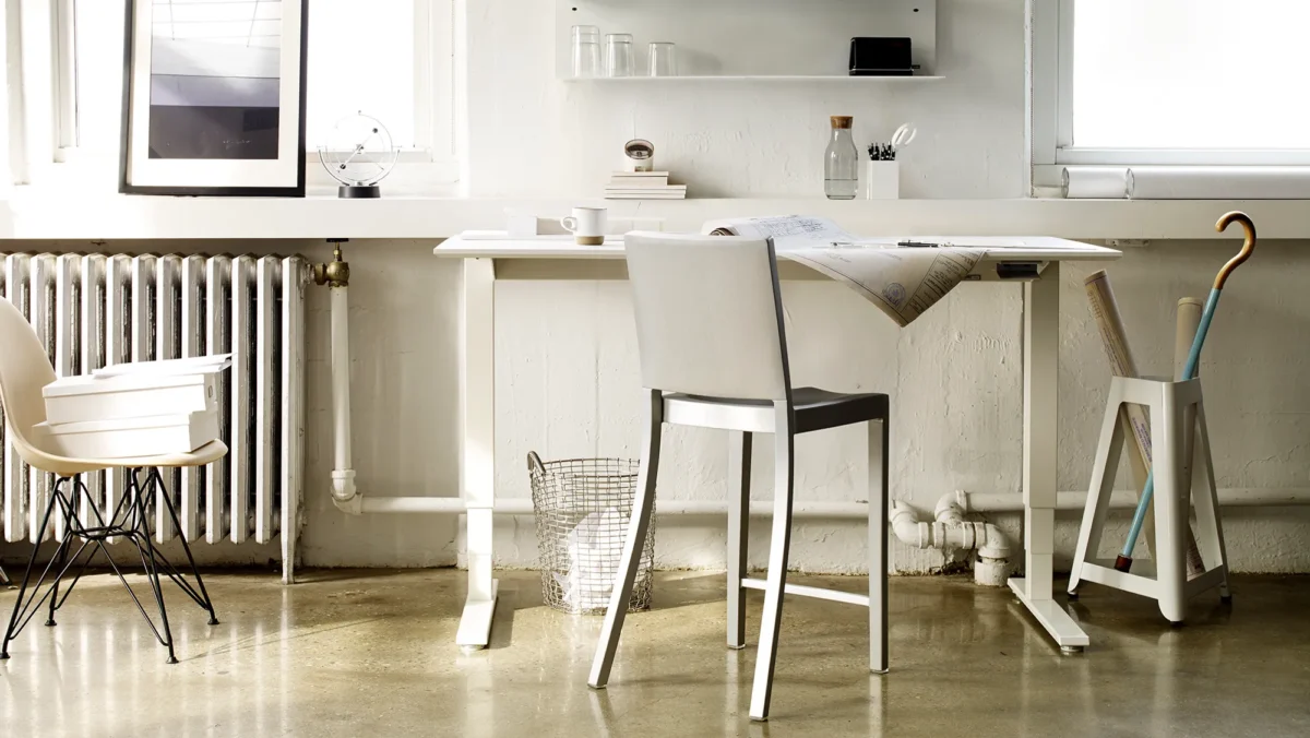The Hudson Stool with Arms by Emeco, perfect for modern interiors with a comfortable, sturdy design.