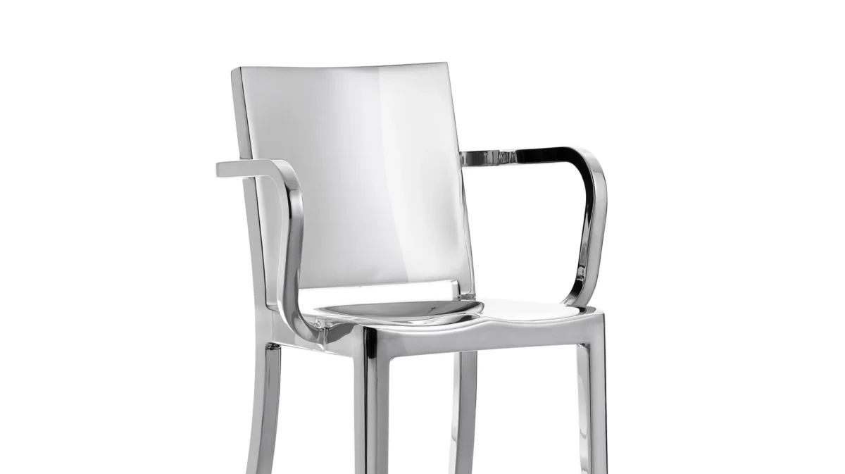 Emeco's Hudson Stool with Arms, combining elegance and functionality for contemporary spaces.
