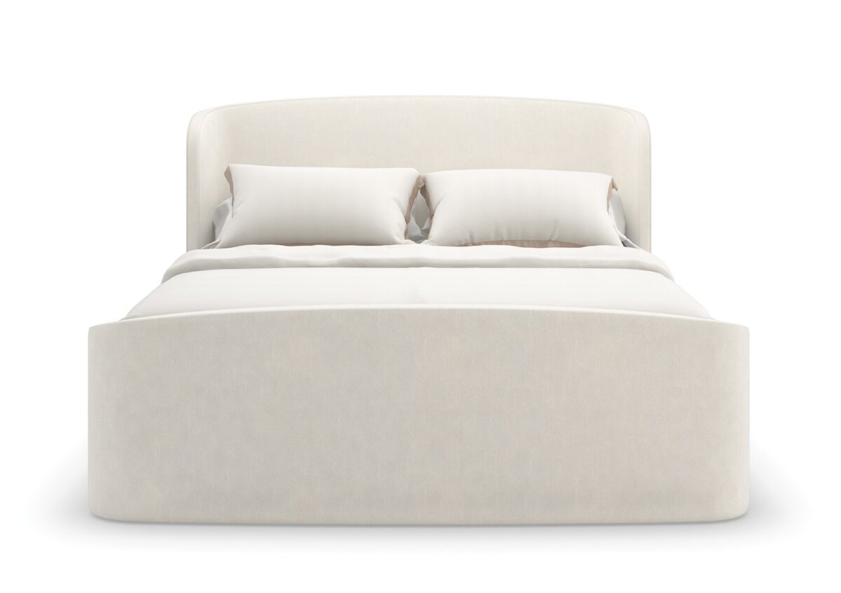 Caracole SOFT EMBRACE King Bed, featuring a tall, deeply tufted headboard that gently curves inward, creating a cocoon-like and inviting feel.