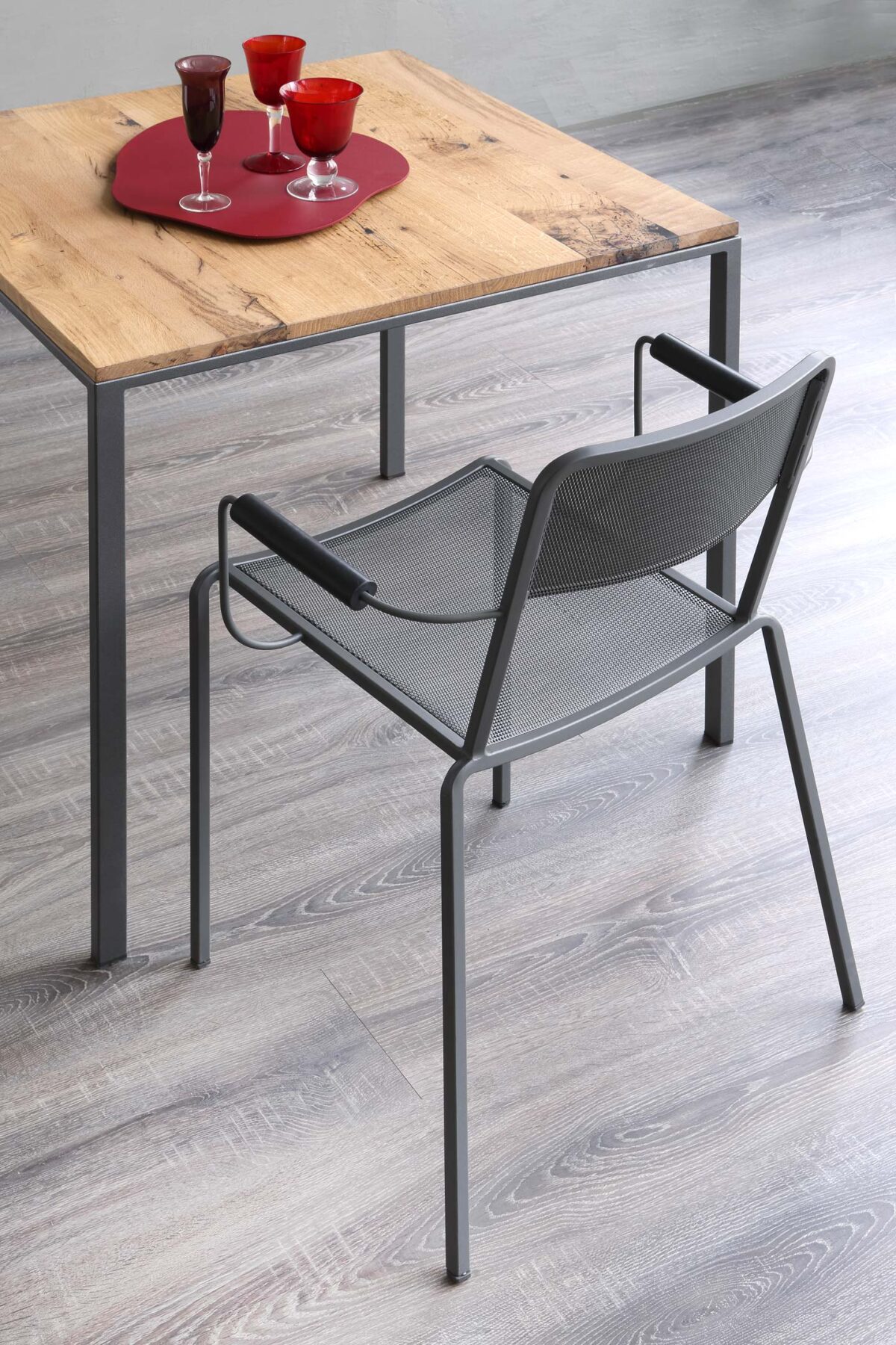 “Ginger 2018 Armchair in natural maple wood, demonstrating its versatility and timeless design suitable for various interiors.”