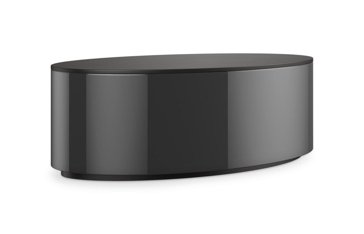 Adele Oval Cocktail Table by Caracole — a sleek oval-shaped cocktail table with a glass top and polished metal frame.