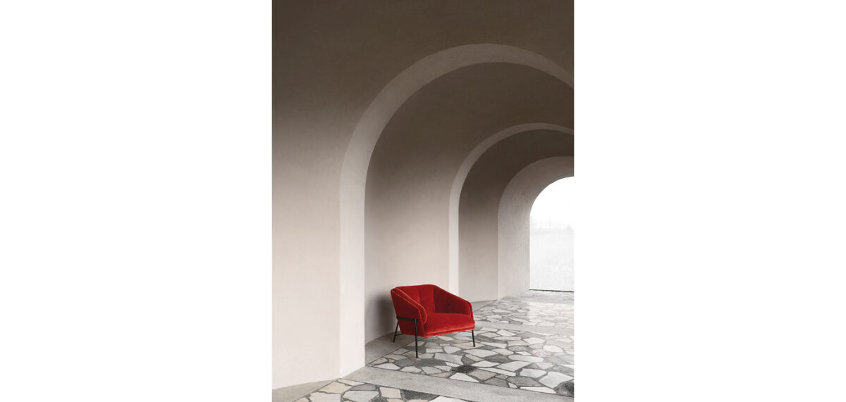 Fashion armchair by Nicoline Italia with elegant lines and metal frame, perfect for modern interiors in Royal Oak, Michigan.