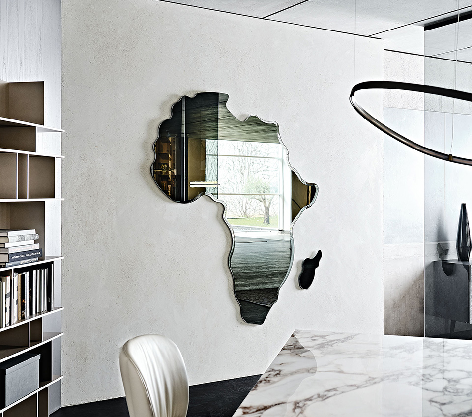 “Cattelan Italia AFRICA Magnum – luxury lounge chair featuring expanded wood arms and premium fabric or leather upholstery”