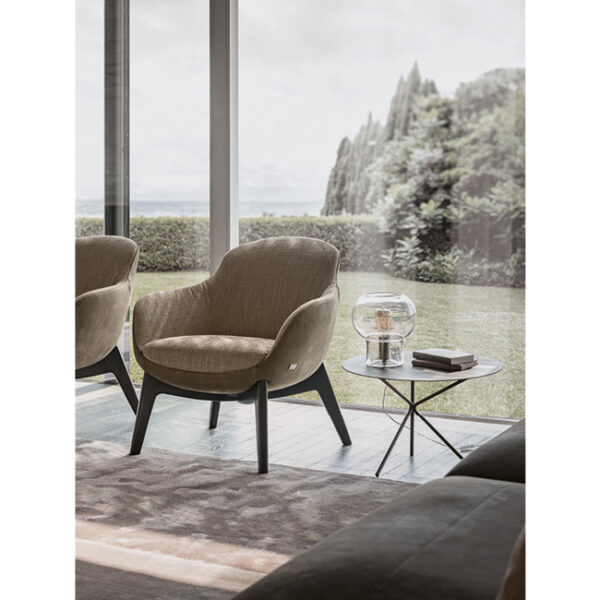 Fly side table by Nicoline Italia featuring a minimalist design with a double K metal base and circular top.
