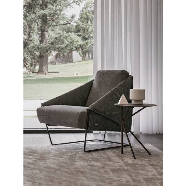 Fly Small side table by Nicoline Italia featuring a minimalist double K metal base and circular top, available in Satin Brass, Antique Bronze, or Mastice finishes.