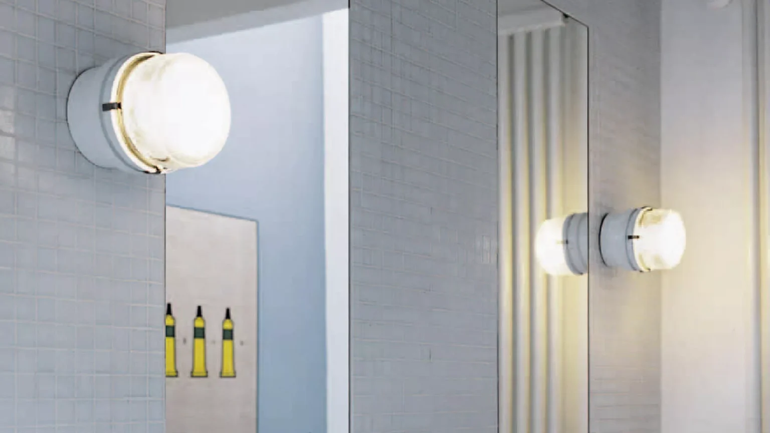 “Fresnel by Oluce modern Italian wall or ceiling lamp – compact design with pressed glass lens and minimalist metal frame”