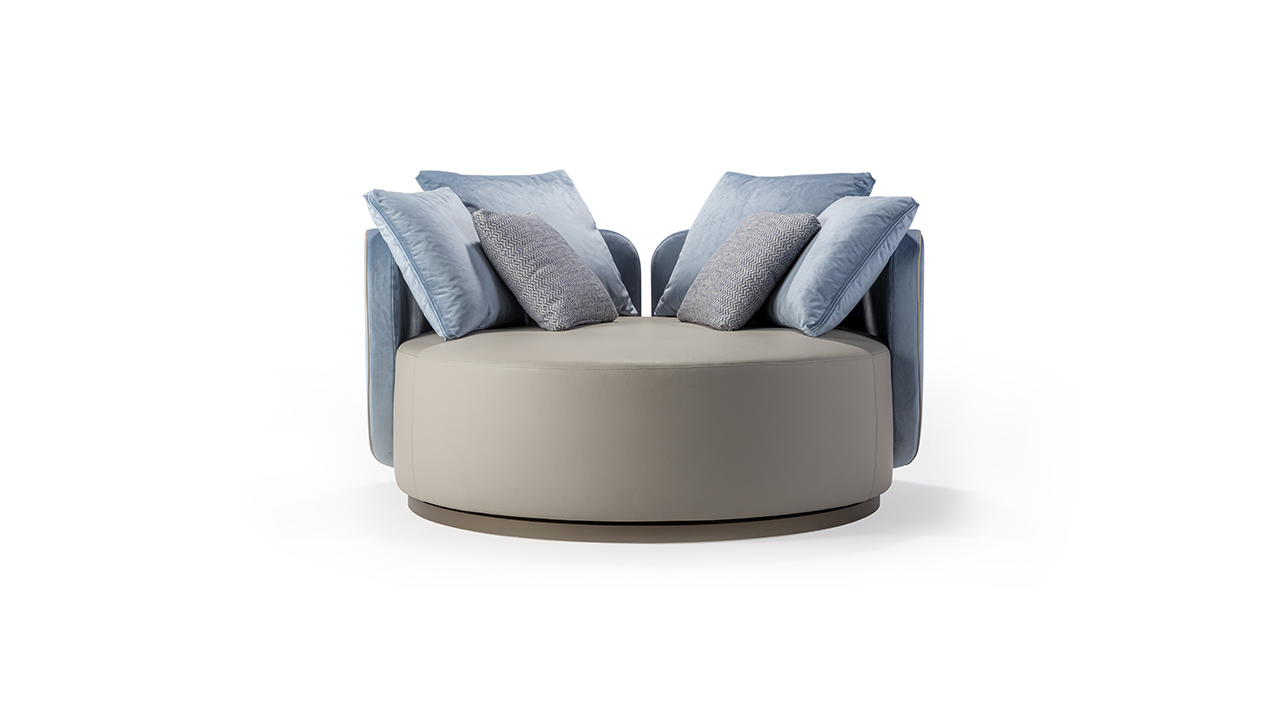 Hug Poltrona by Reflex featured in Troy Michigan showroom, modern Italian luxury seating design.