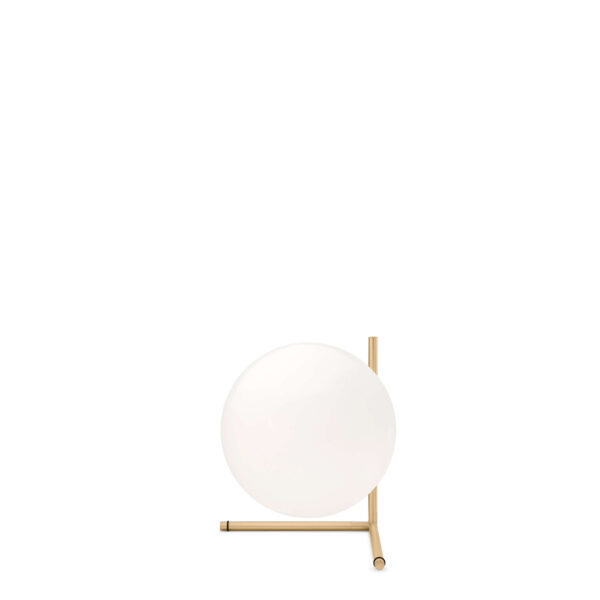IC Lights T2 by Flos in brushed brass, featuring a globe-shaped diffuser and minimalist geometric base.