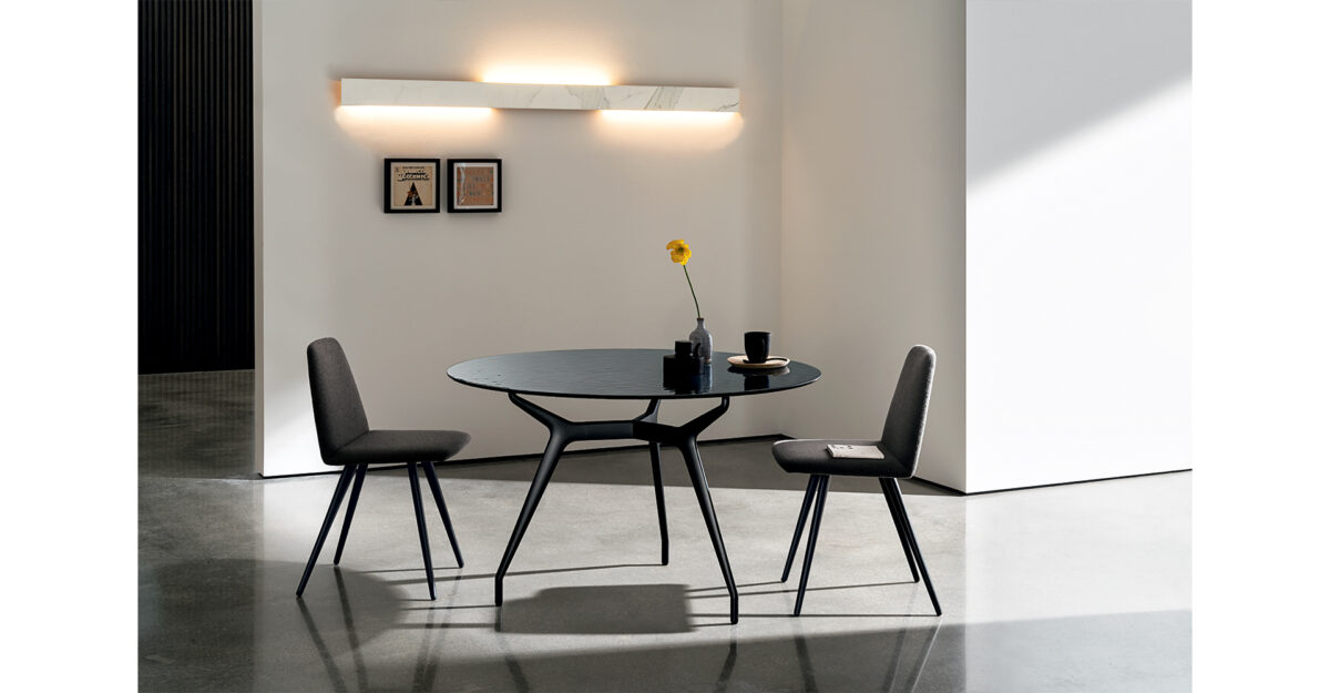 “Sovet Arkos Round – contemporary designer table with circular top and bold architectural structure”