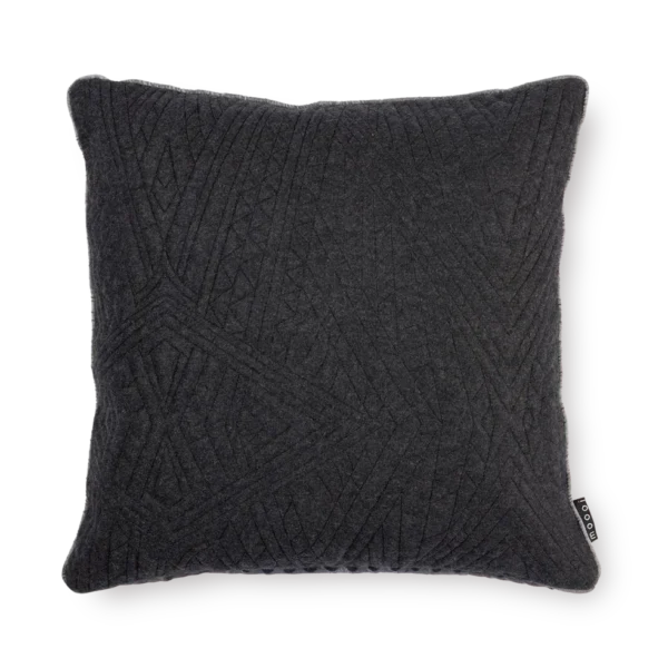 Quilted Dwarf Rhino pillow by Moooi on modern sofa