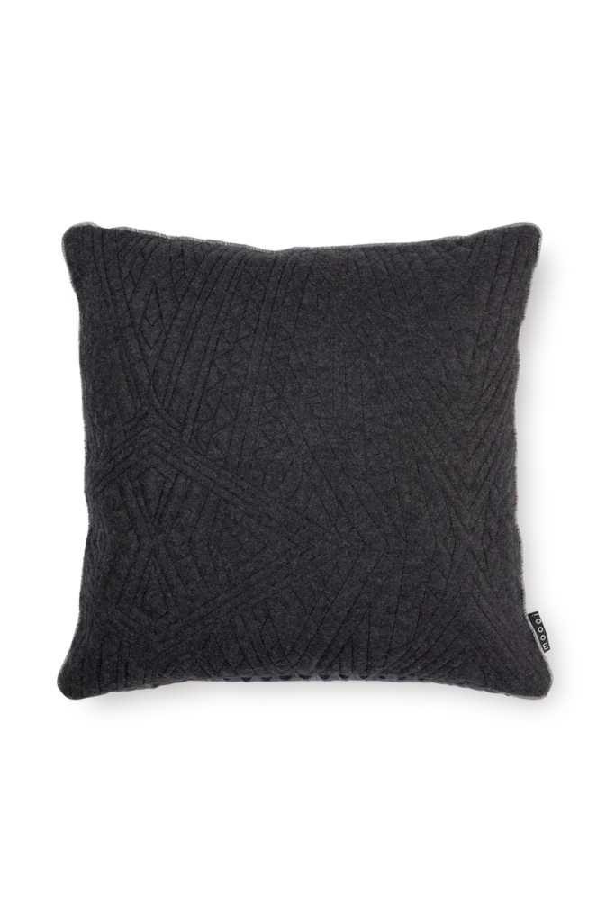 Quilted Dwarf Rhino pillow by Moooi on modern sofa
