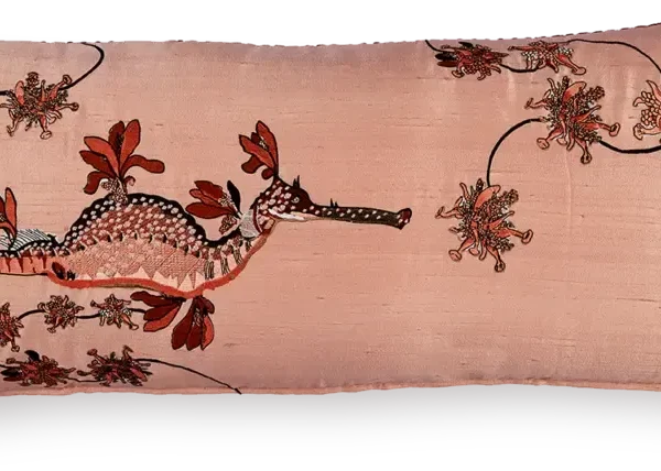 Embroidered Blooming Seadragon pillow by Moooi on couch