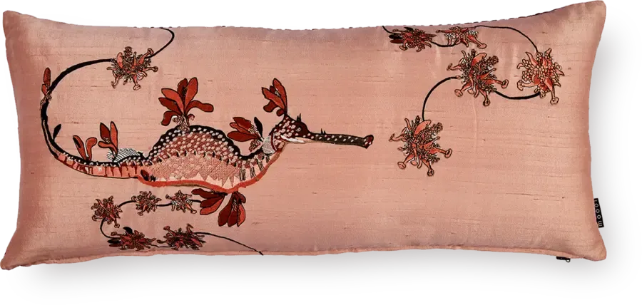 Embroidered Blooming Seadragon pillow by Moooi on couch